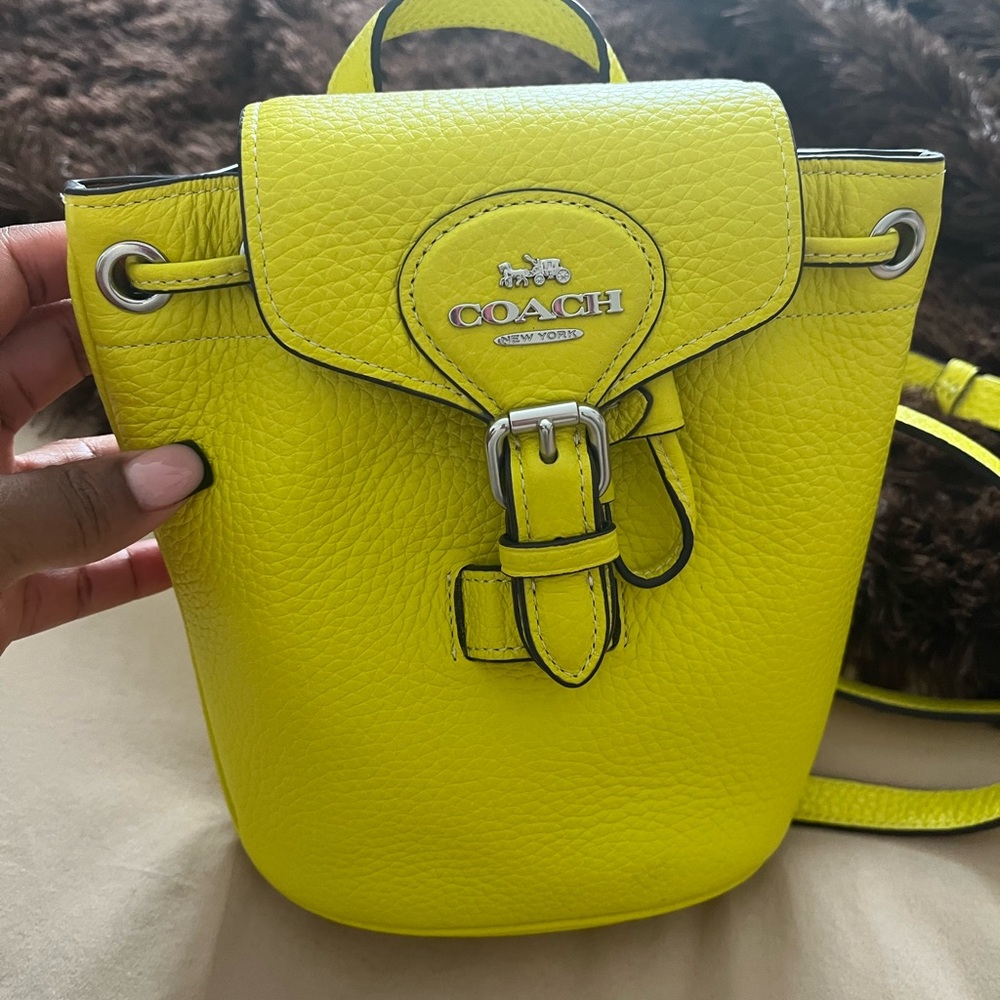 Coach mini lime green backpack!